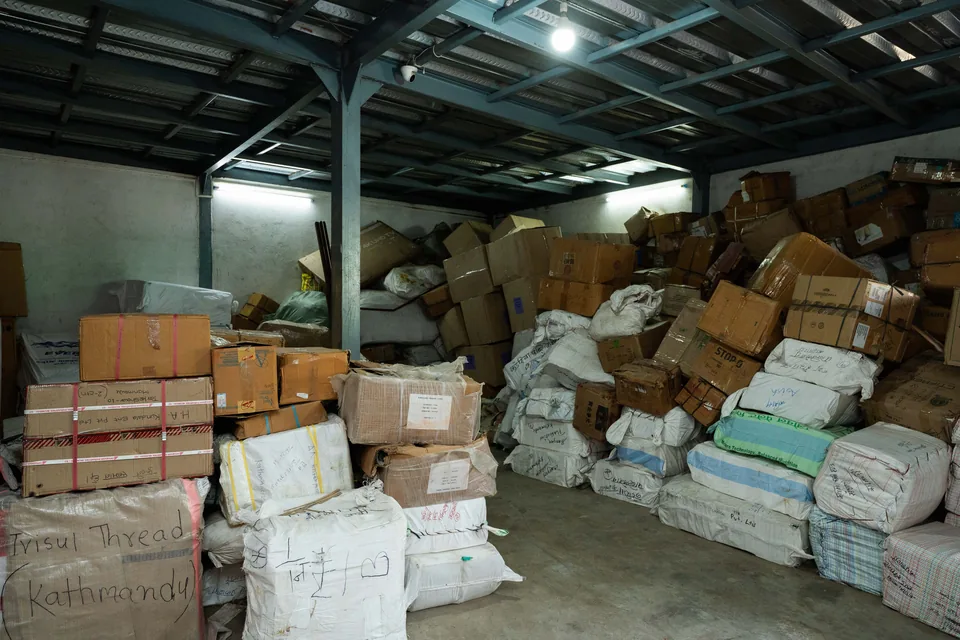 Stacked parcels in Darshan Transport warehouse storage